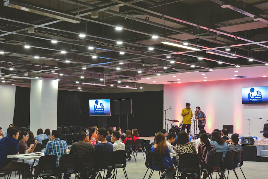 Large event venue readied for audience with stage screens